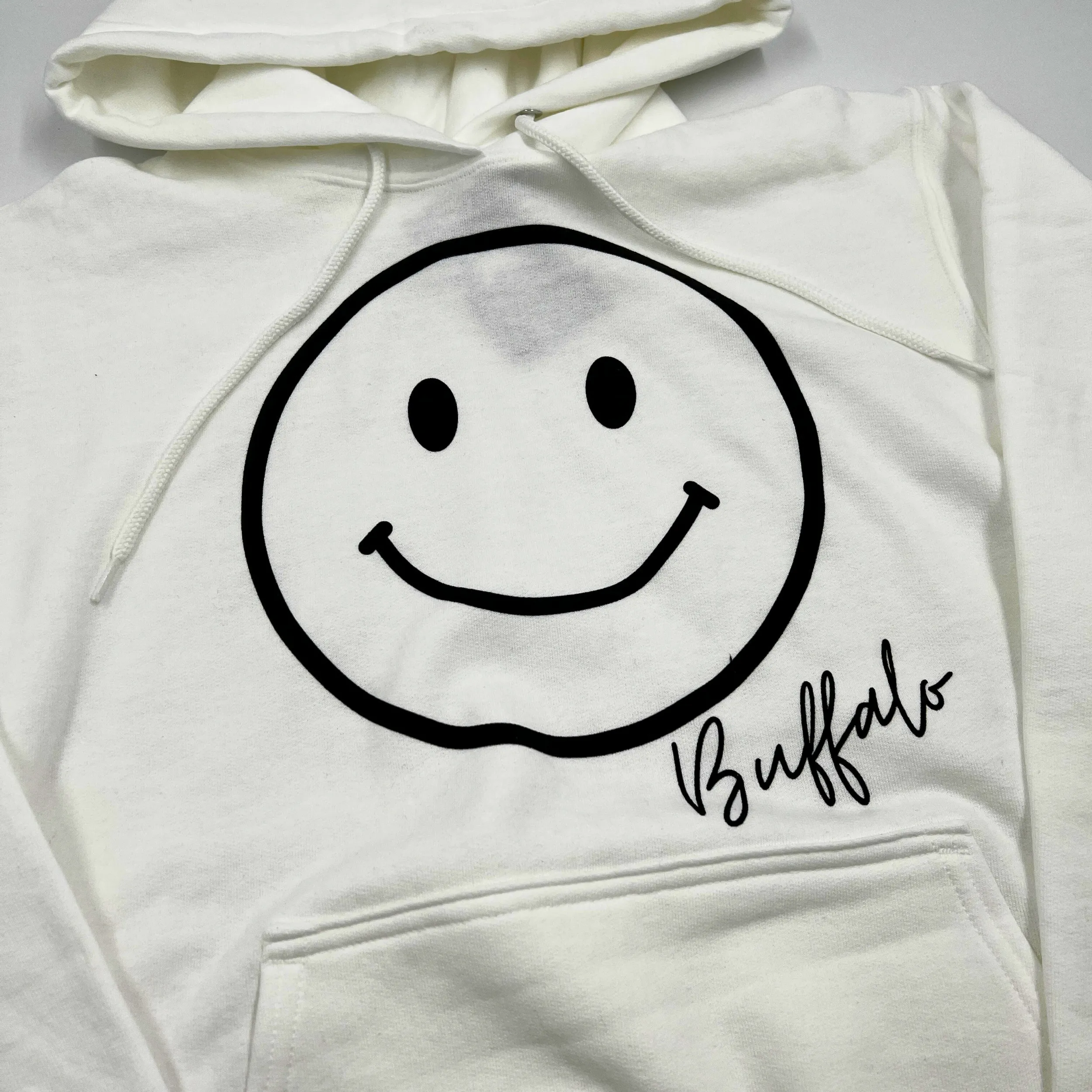 Smiley Face With Buffalo Wordmark White Hoodie